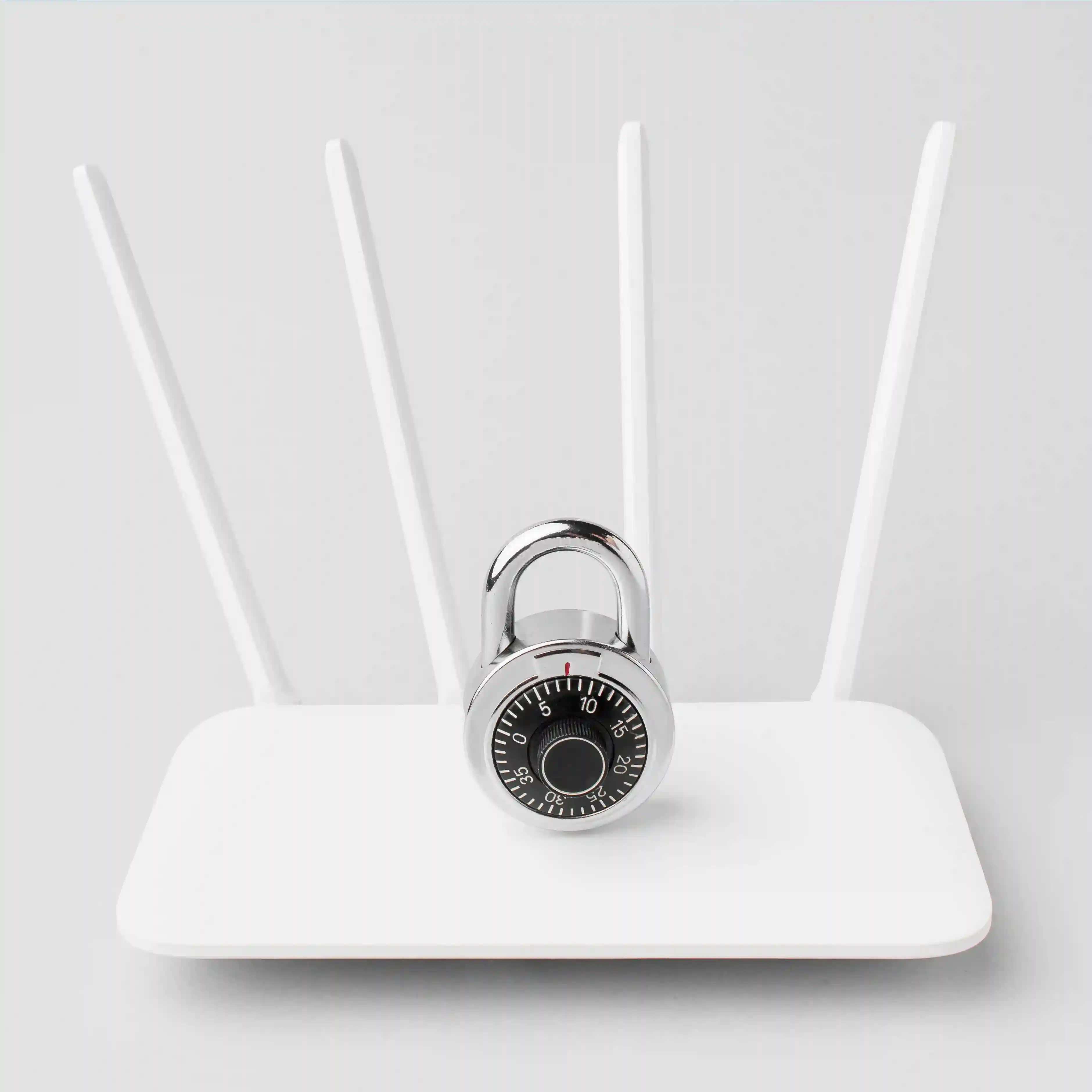 Router hardware with a padlock, representing secured network configuration