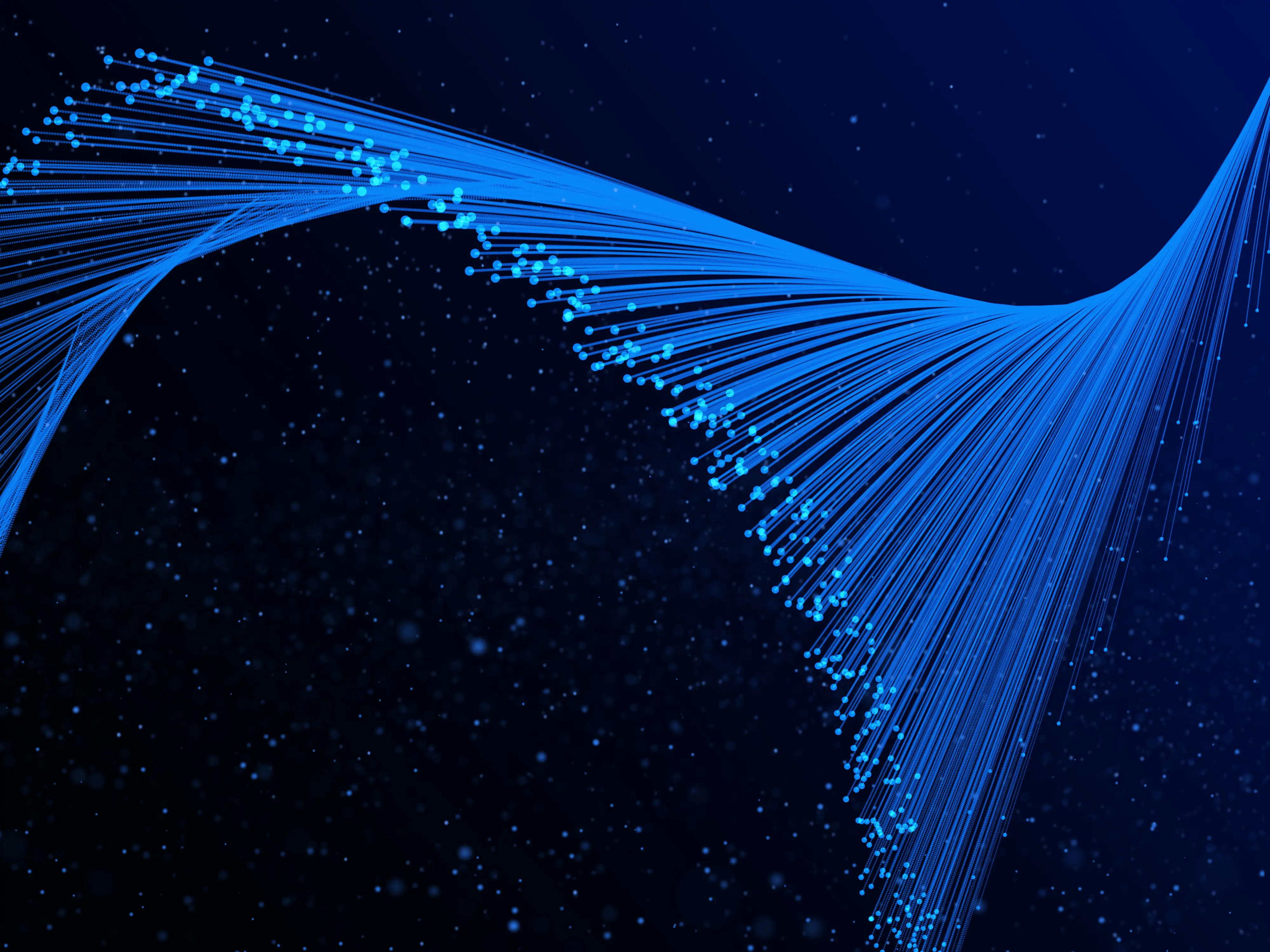 Glowing fibre optic strands carrying light